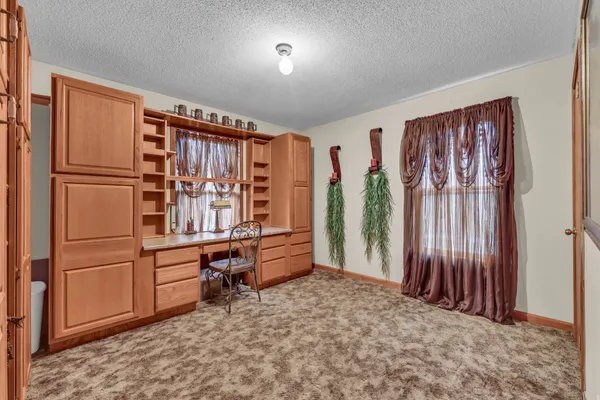 a very nice looking room with many windows