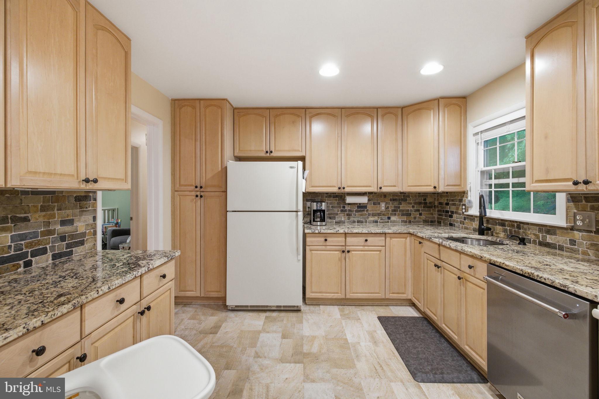 11937 Bayswater Road Gaithersburg, MD 20878 - Photo 12 of 55 Modern kitchen with elegant finishes.