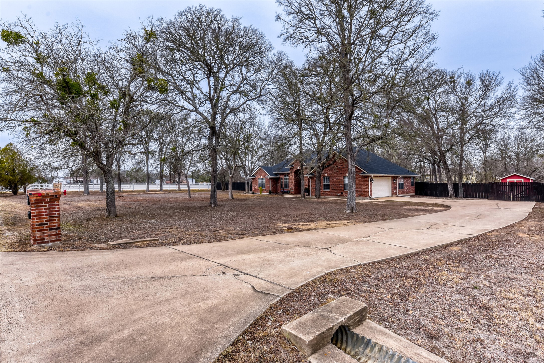 104 Spring Branch Bastrop, TX 78602 - Photo 26 of 32 a view of road with trees