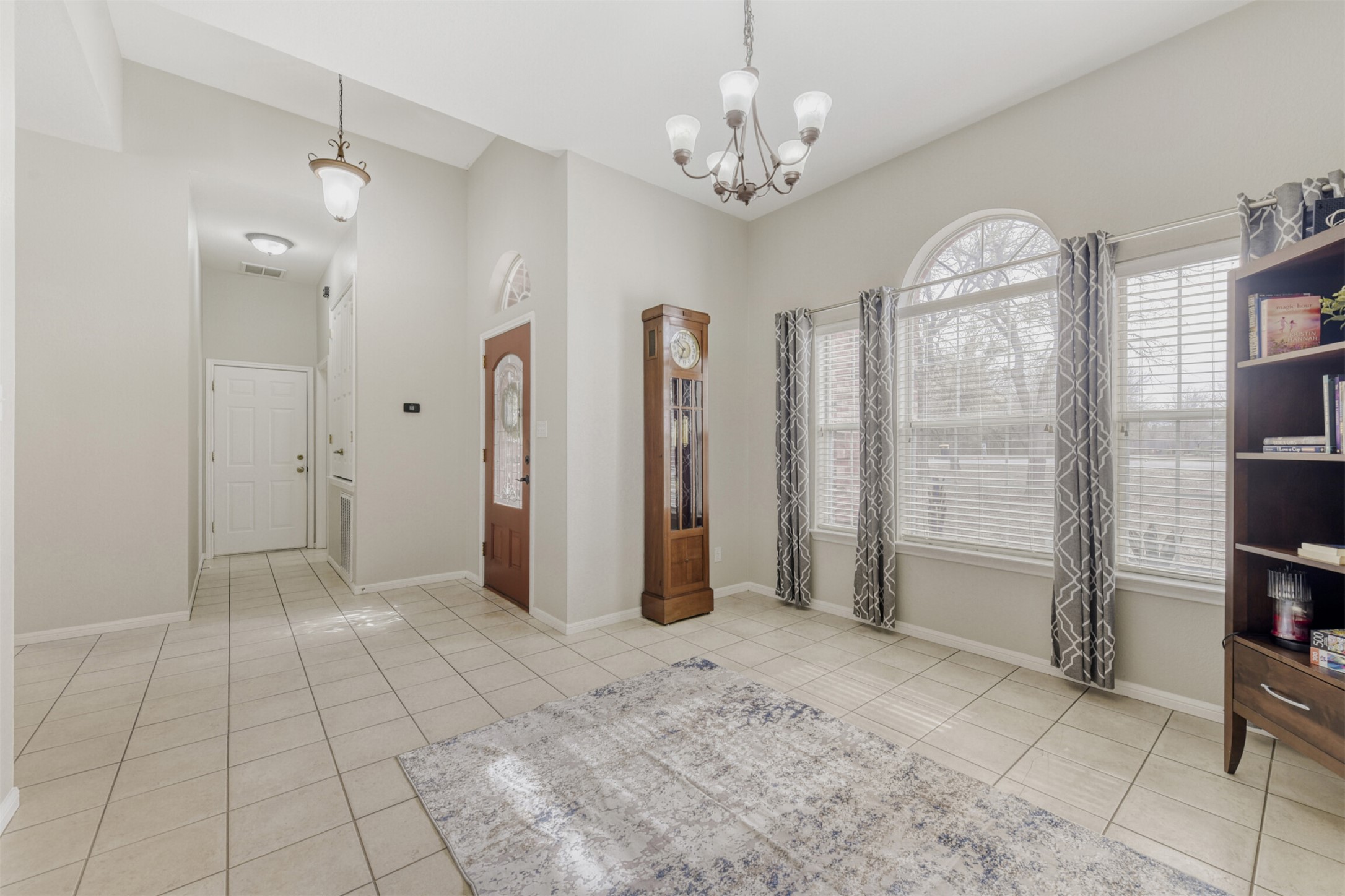 104 Spring Branch Bastrop, TX 78602 - Photo 6 of 32 a view of a hallway with chandelier
