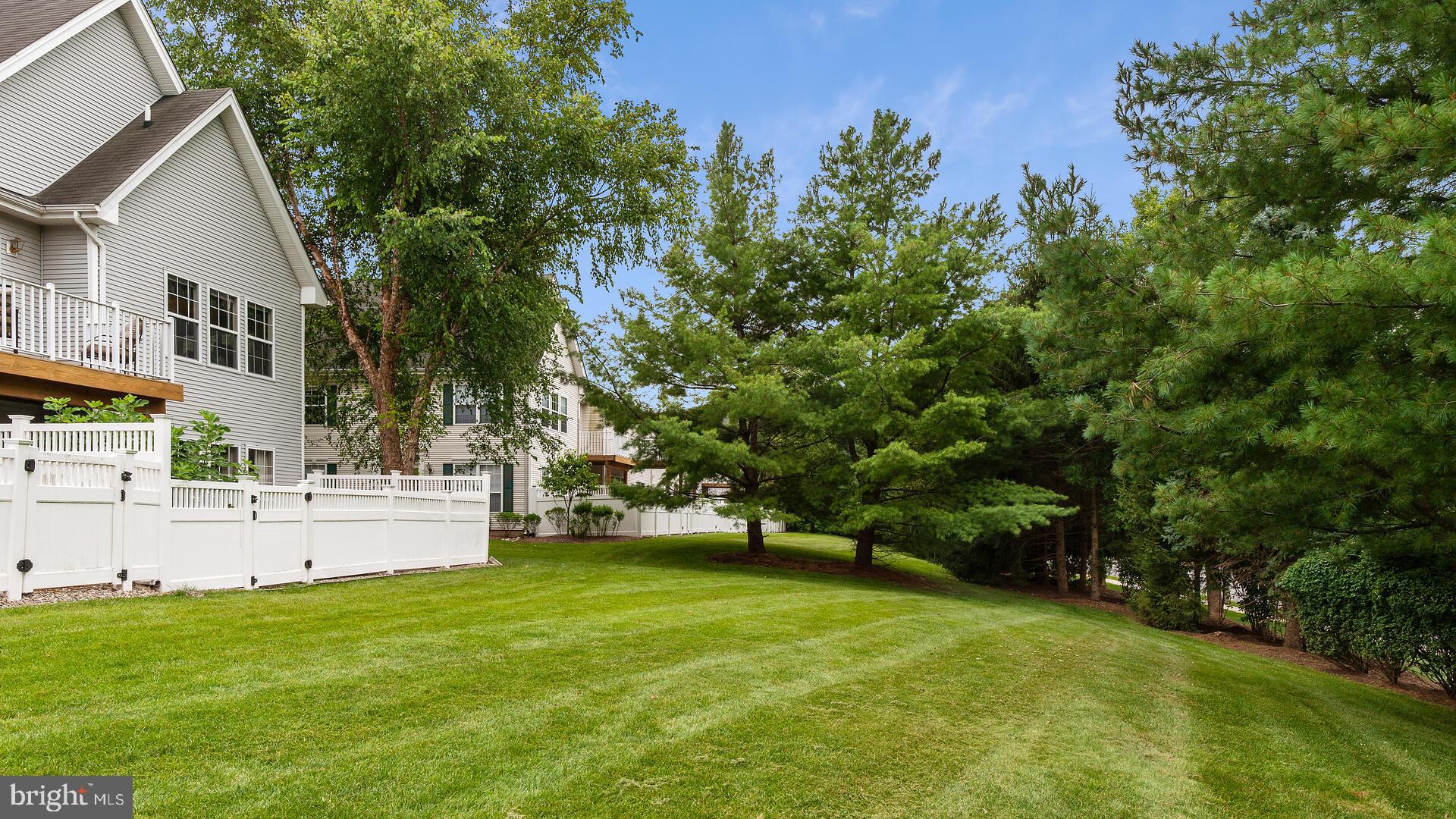 144 Coburn Road Pennington, NJ 08534 - Photo 28 of 32 Common space beyond the enclosed patio area