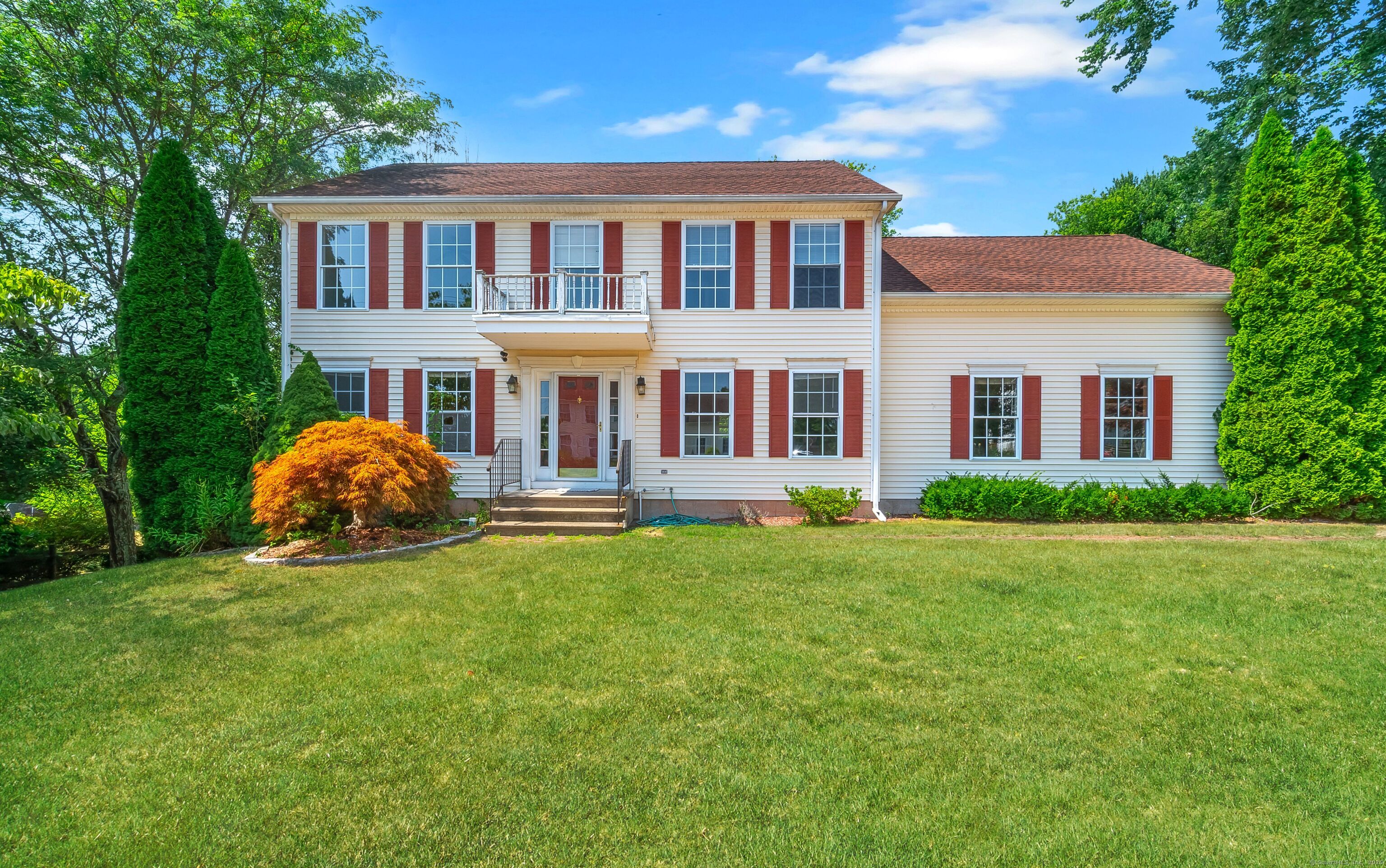 112 Sky View Circle Hamden, CT 06514 - Photo 1 of 1 a front view of a house with an outdoor space and deck
