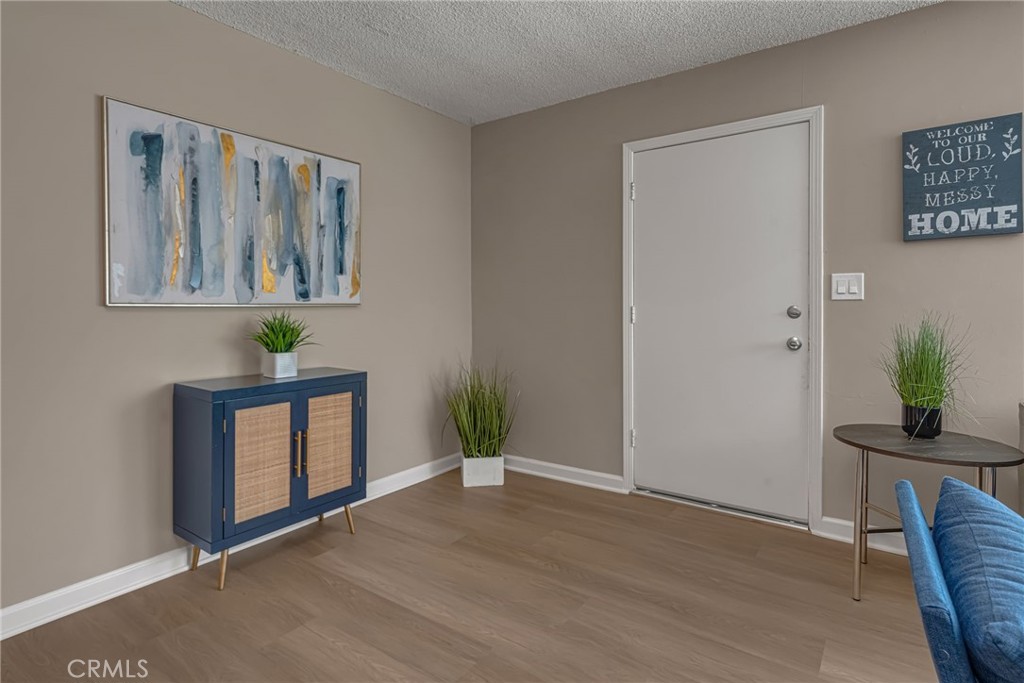 217 East 221st Street Carson, CA 90745 - Photo 18 of 73 a view of an entryway with wooden floor