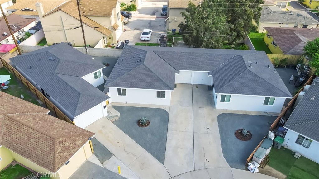 217 East 221st Street Carson, CA 90745 - Photo 69 of 73 an aerial view of a house with a yard