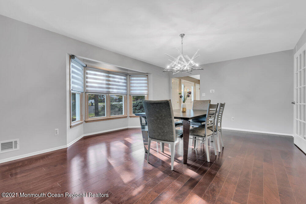 67 Chelsea Road Jackson, NJ 08527 - Photo 16 of 53 a view of a dining room with furniture window and wooden floor