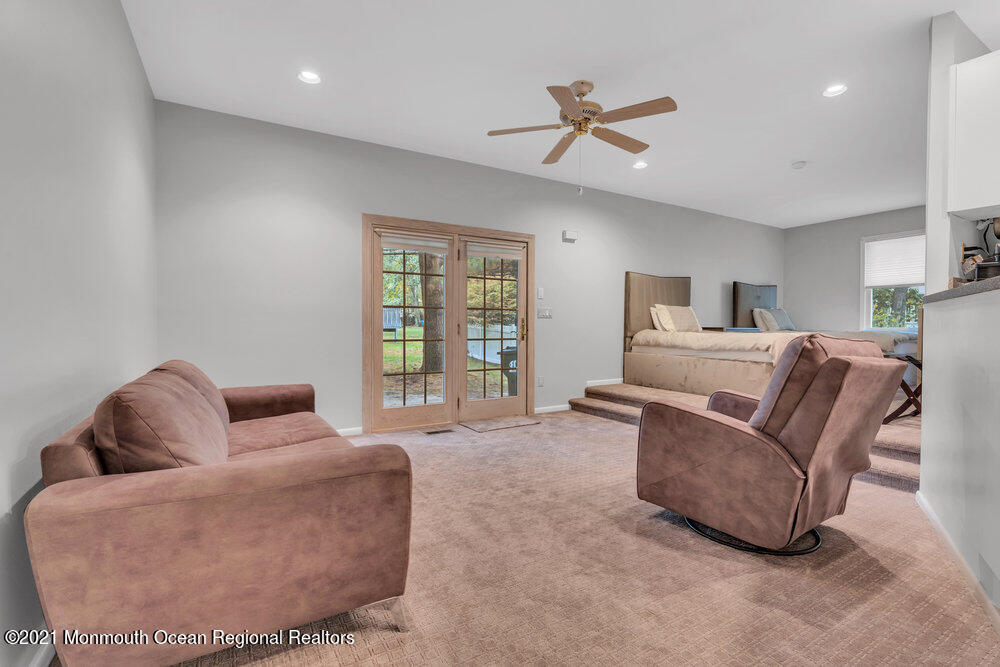 67 Chelsea Road Jackson, NJ 08527 - Photo 31 of 53 a living room with furniture and a window