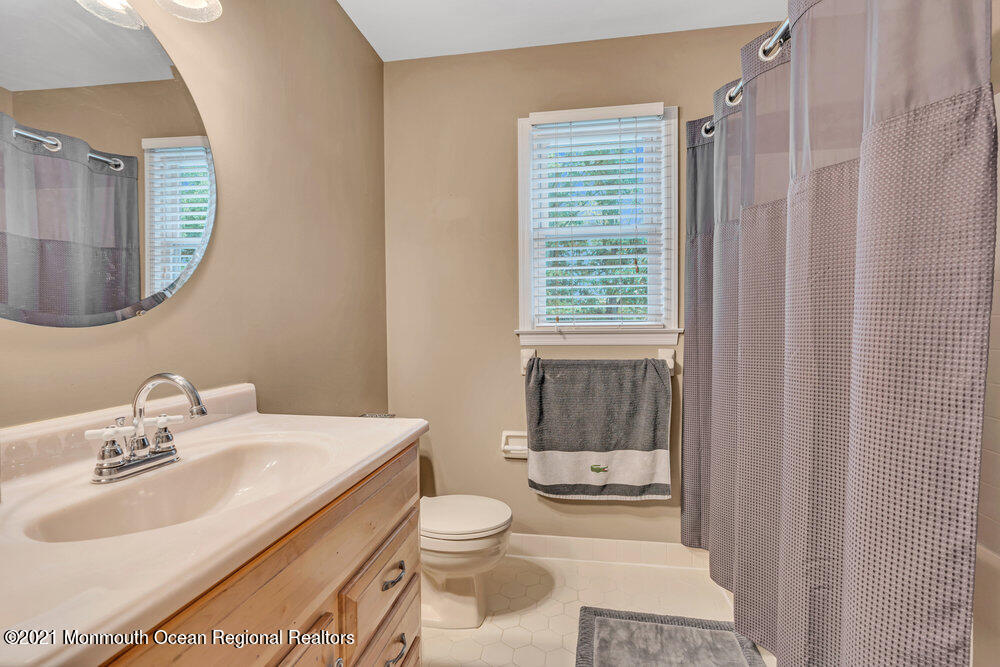 67 Chelsea Road Jackson, NJ 08527 - Photo 38 of 53 a bathroom with a sink a toilet and shower