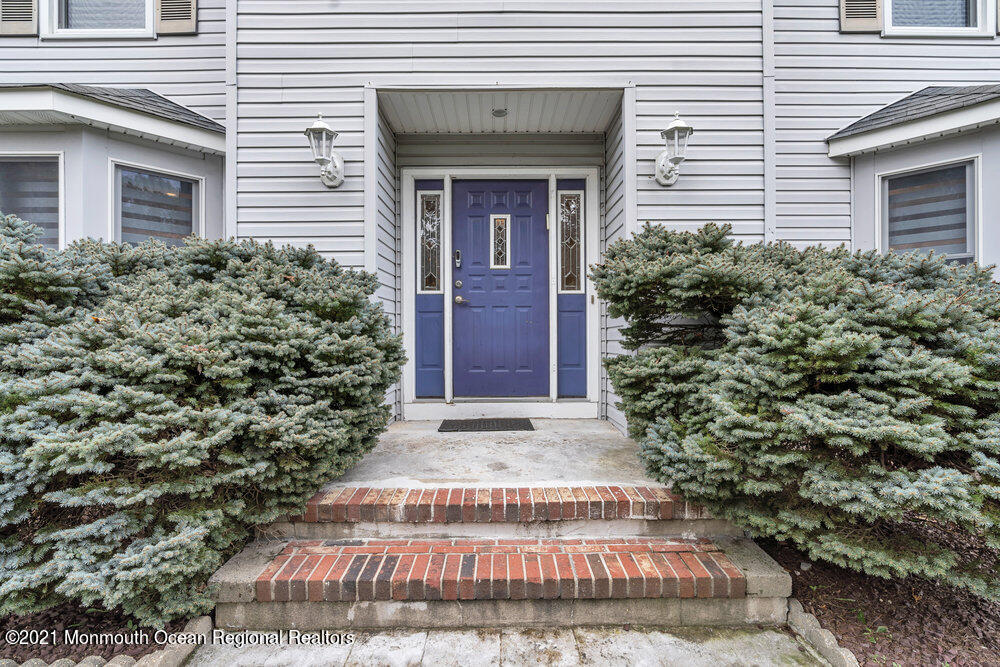 67 Chelsea Road Jackson, NJ 08527 - Photo 9 of 53 a front view of a house with a yard