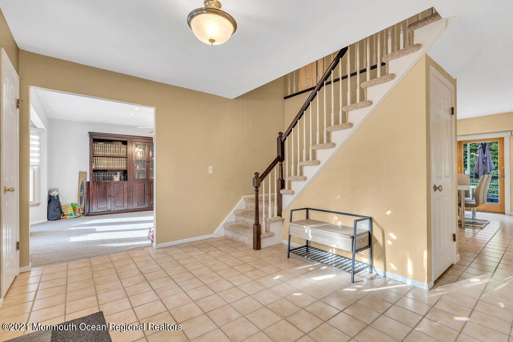 67 Chelsea Road Jackson, NJ 08527 - Photo 10 of 53 a view of staircase with white walls and white walls