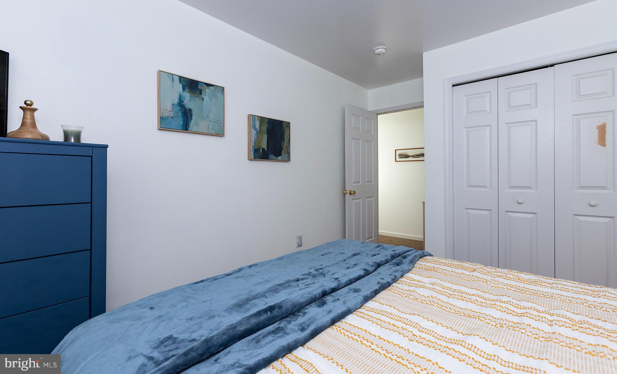 606 Butterfly Circle Dallastown, PA 17313 - Photo 14 of 40 a bedroom with a bed and a dresser