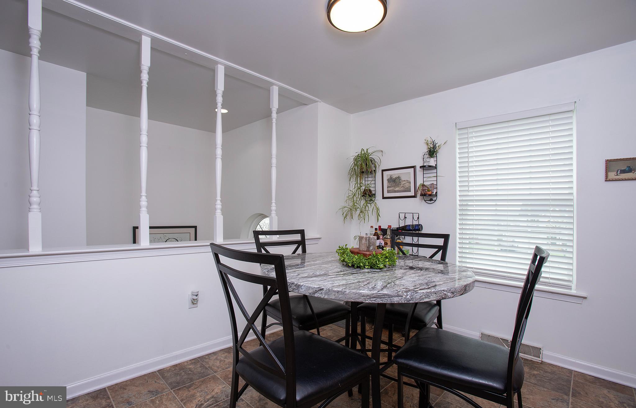 606 Butterfly Circle Dallastown, PA 17313 - Photo 7 of 40 a view of a dining room with furniture and window