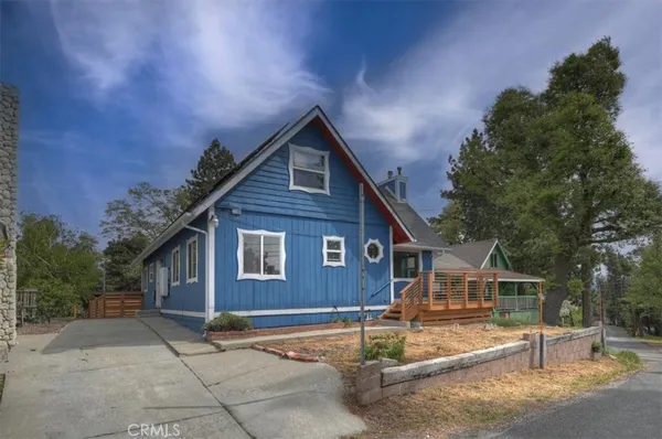 a front view of a house with a garage