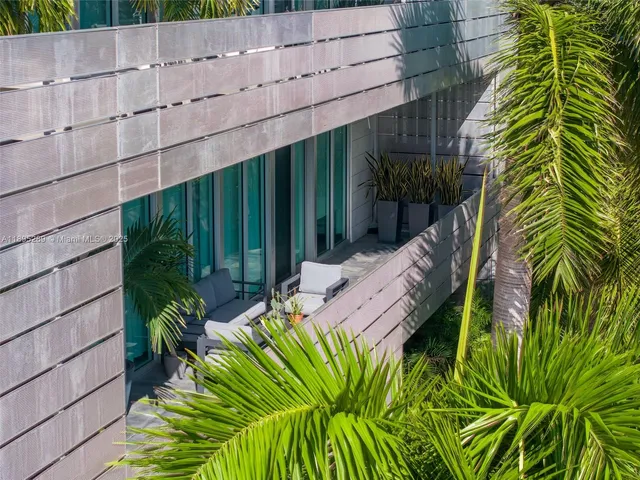 a view of a backyard with plants