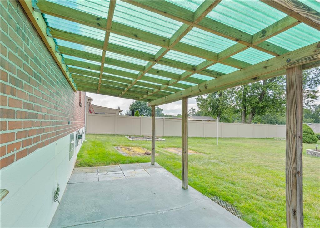115 Rockwood Street Monroeville, PA 15146 - Photo 12 of 32 a view of a backyard with a small cabin