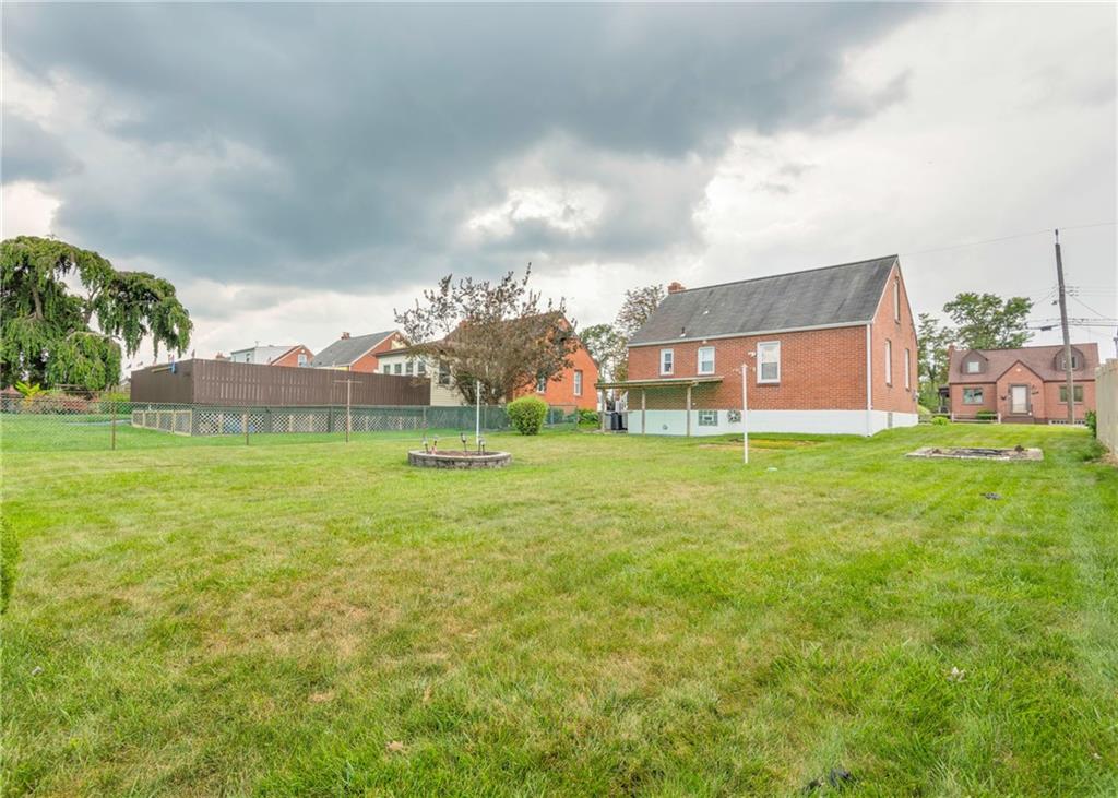 115 Rockwood Street Monroeville, PA 15146 - Photo 14 of 32 a view of a building with a big yard