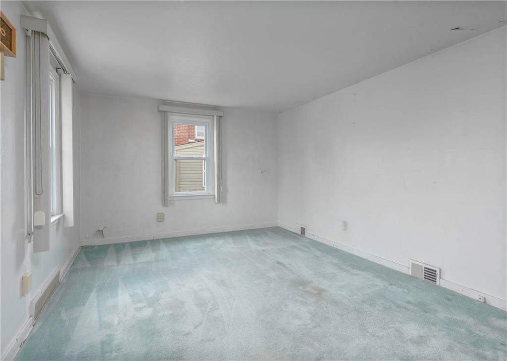 115 Rockwood Street Monroeville, PA 15146 - Photo 16 of 32 a view of an empty room with a window