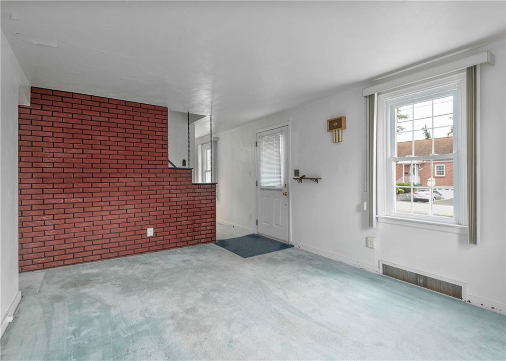 115 Rockwood Street Monroeville, PA 15146 - Photo 17 of 32 a view of an empty room with a window