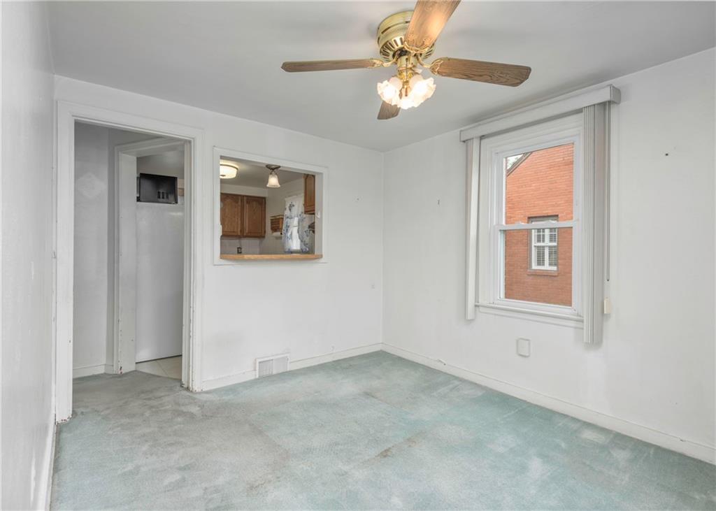 115 Rockwood Street Monroeville, PA 15146 - Photo 18 of 32 a view of an empty room with a window