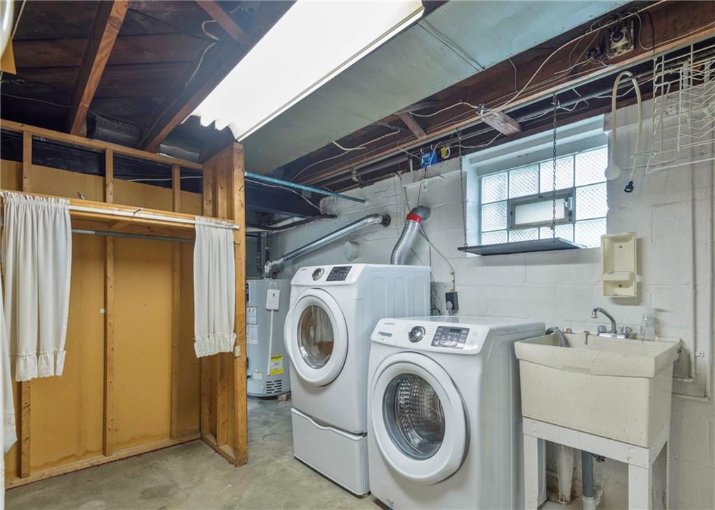 115 Rockwood Street Monroeville, PA 15146 - Photo 32 of 32 a utility room with dryer and washer