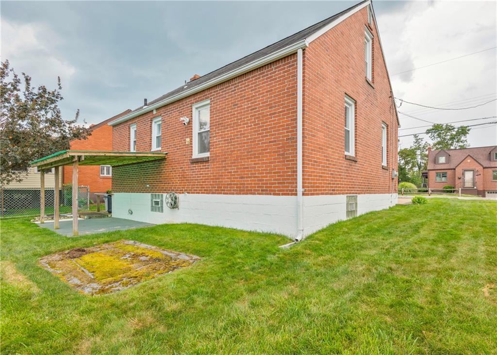 115 Rockwood Street Monroeville, PA 15146 - Photo 9 of 32 a view of backyard with a garden