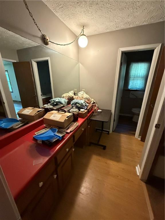 7260 Cox Road Cumming, GA 30028 - Photo 13 of 18 a room with furniture and mirror