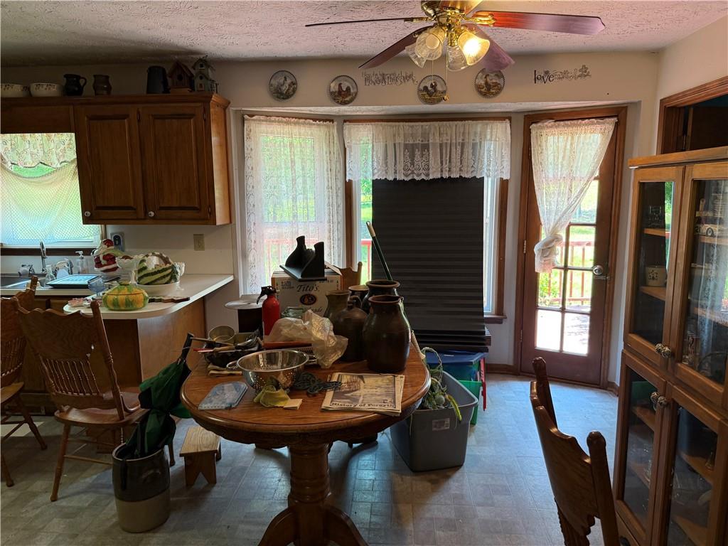 7260 Cox Road Cumming, GA 30028 - Photo 7 of 18 a room with furniture and a fireplace