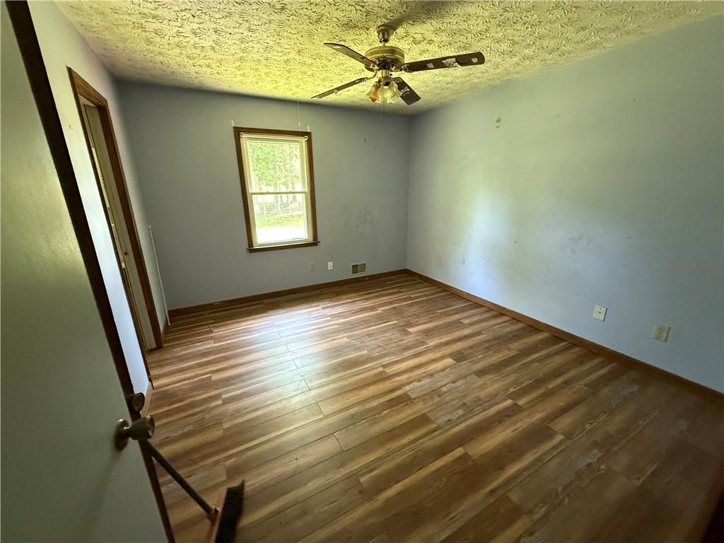 7260 Cox Road Cumming, GA 30028 - Photo 8 of 18 a view of an empty room