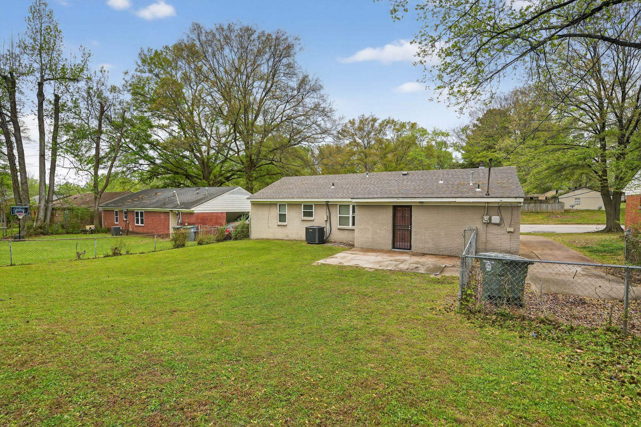3741 Ridgemont Road Memphis, TN 38128 - Photo 10 of 32 Rear view of property with a patio area, a fenced backyard, and brick siding