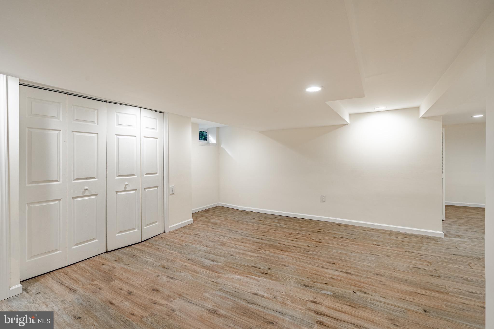 657 Walker Road Wayne, PA 19087 - Photo 13 of 66 wooden floor in an empty room with a window
