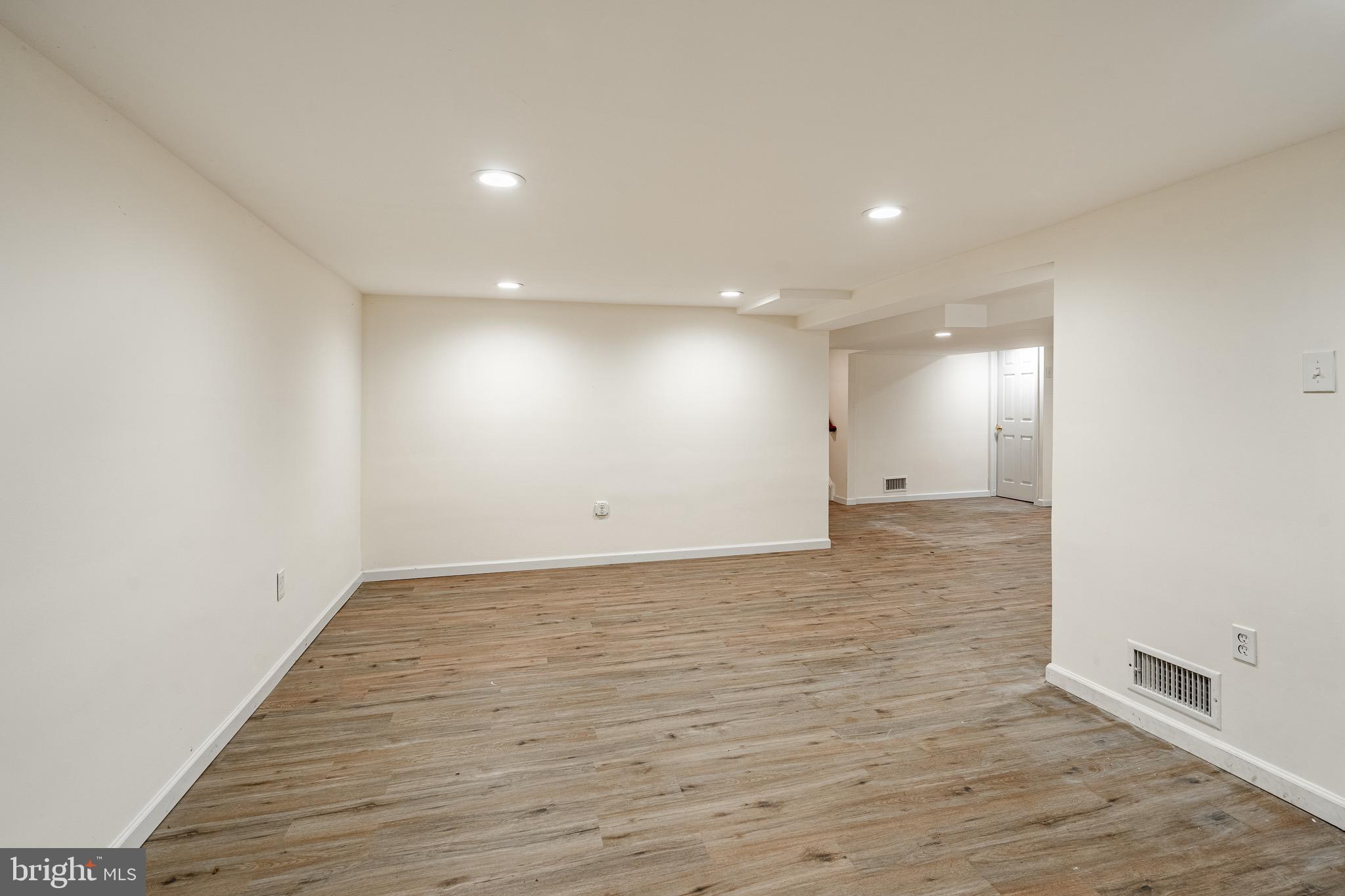 657 Walker Road Wayne, PA 19087 - Photo 16 of 66 a view of a room with wooden floor and natural light