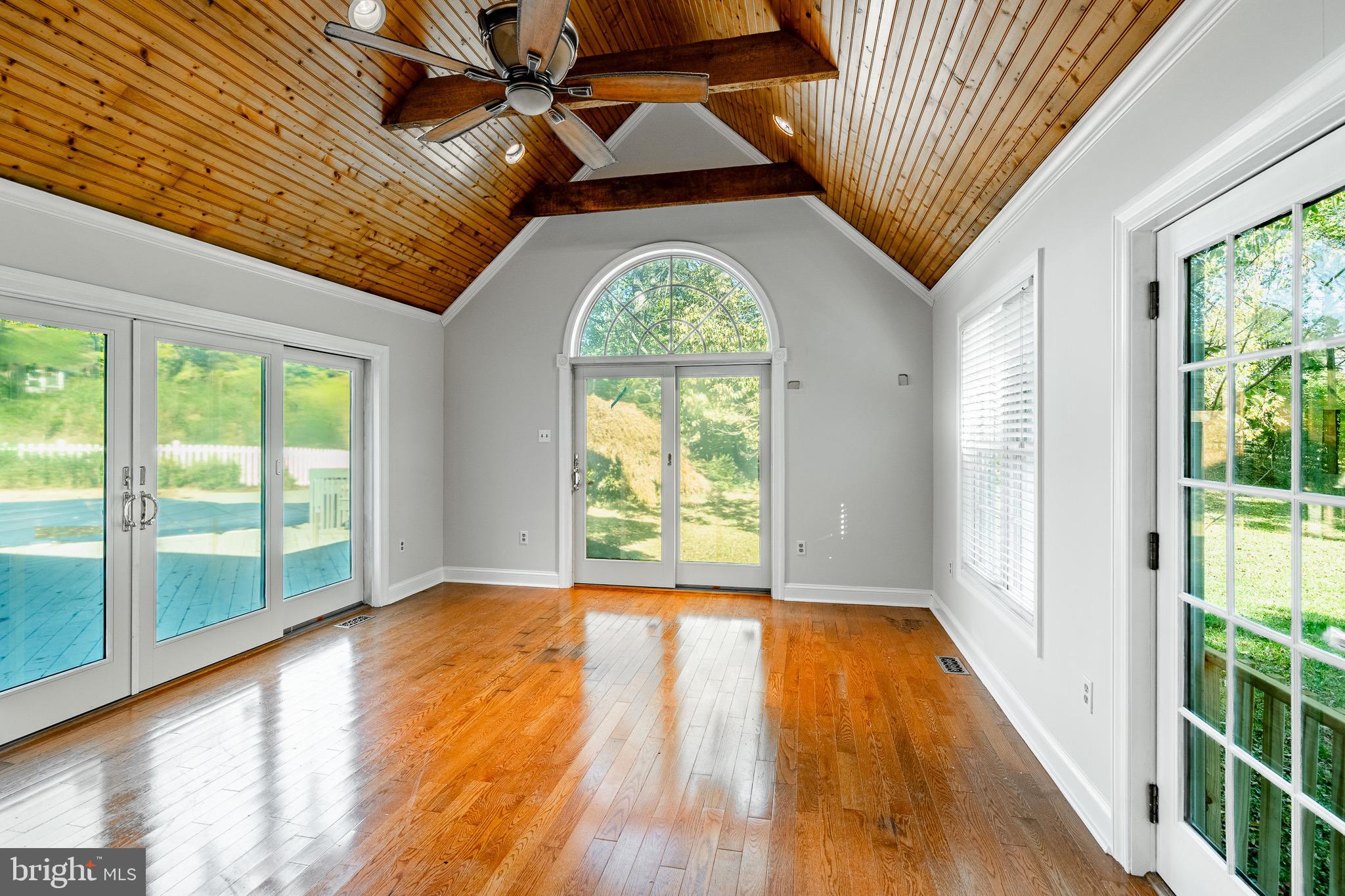 657 Walker Road Wayne, PA 19087 - Photo 28 of 66 a view of empty room with wooden floor and fan