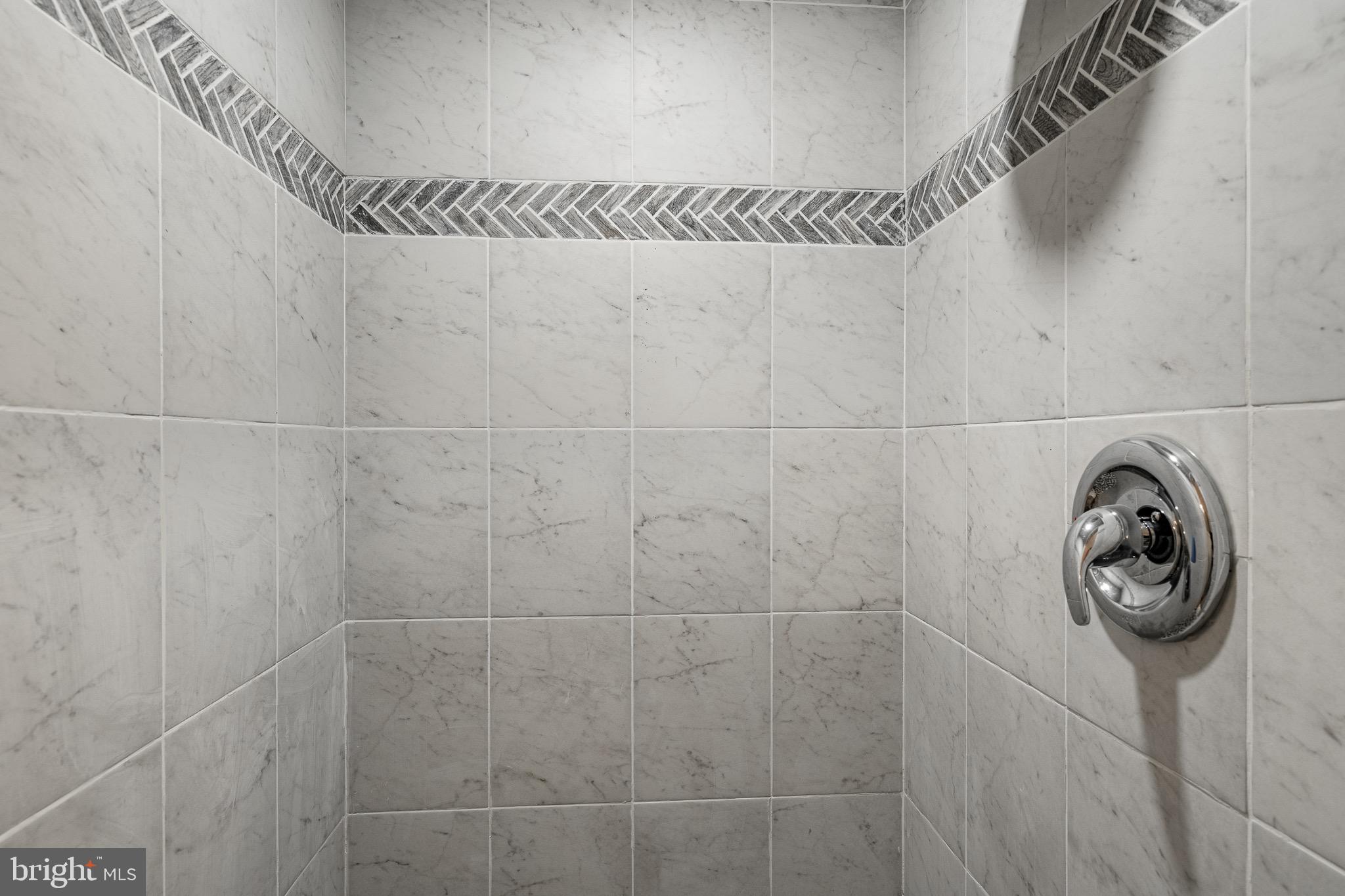 657 Walker Road Wayne, PA 19087 - Photo 38 of 66 a bathroom with a shower and a sink