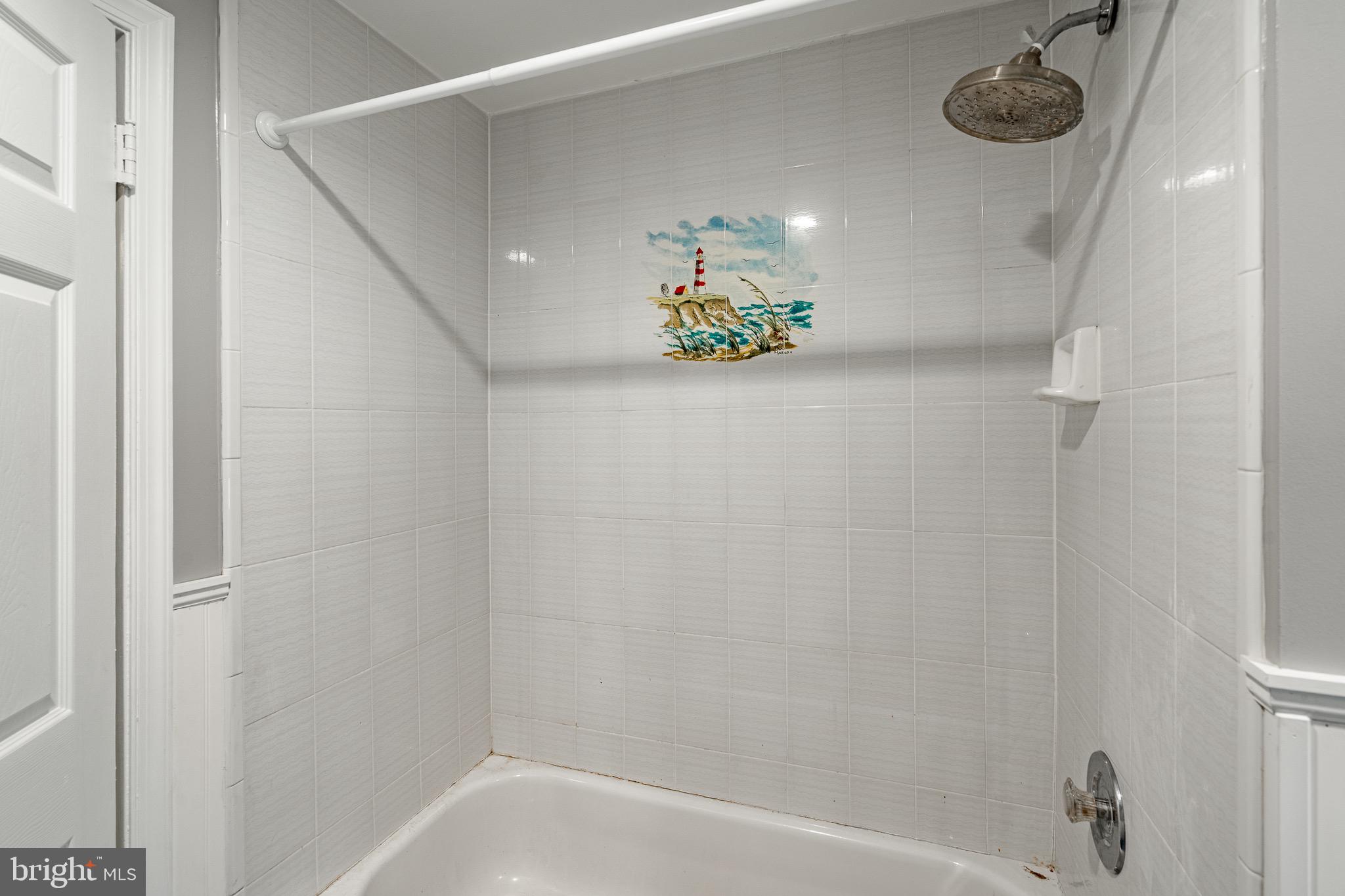 657 Walker Road Wayne, PA 19087 - Photo 40 of 66 a bathroom with a bathtub