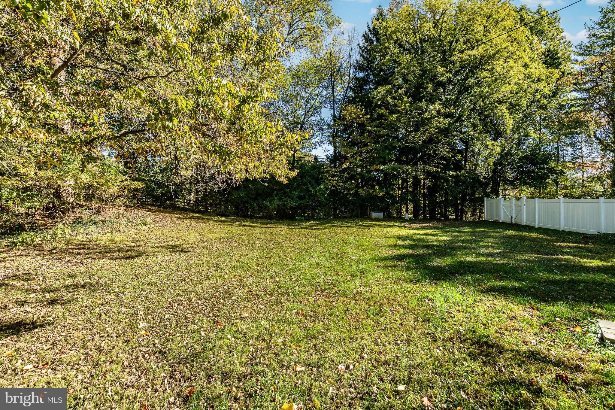 657 Walker Road Wayne, PA 19087 - Photo 53 of 66 a view of outdoor space with deck and yard