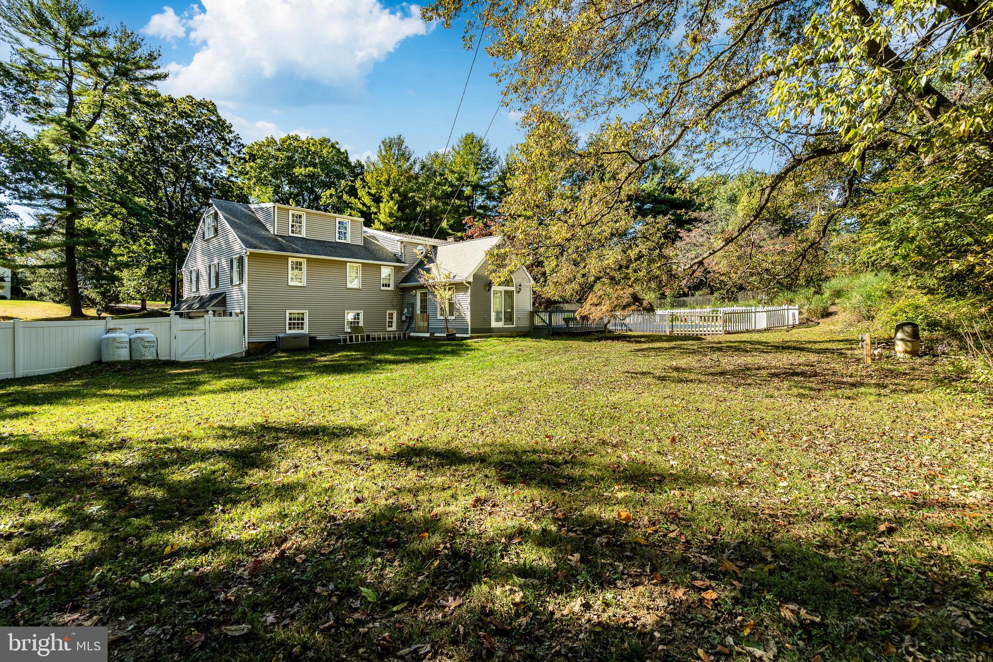 657 Walker Road Wayne, PA 19087 - Photo 54 of 66 a view of a house with a yard
