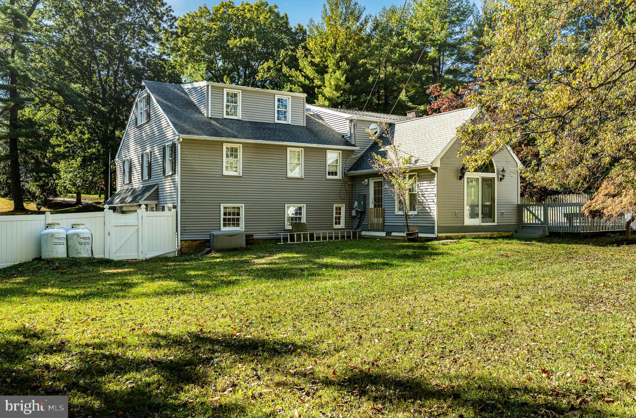 657 Walker Road Wayne, PA 19087 - Photo 55 of 66 a view of a house with a yard