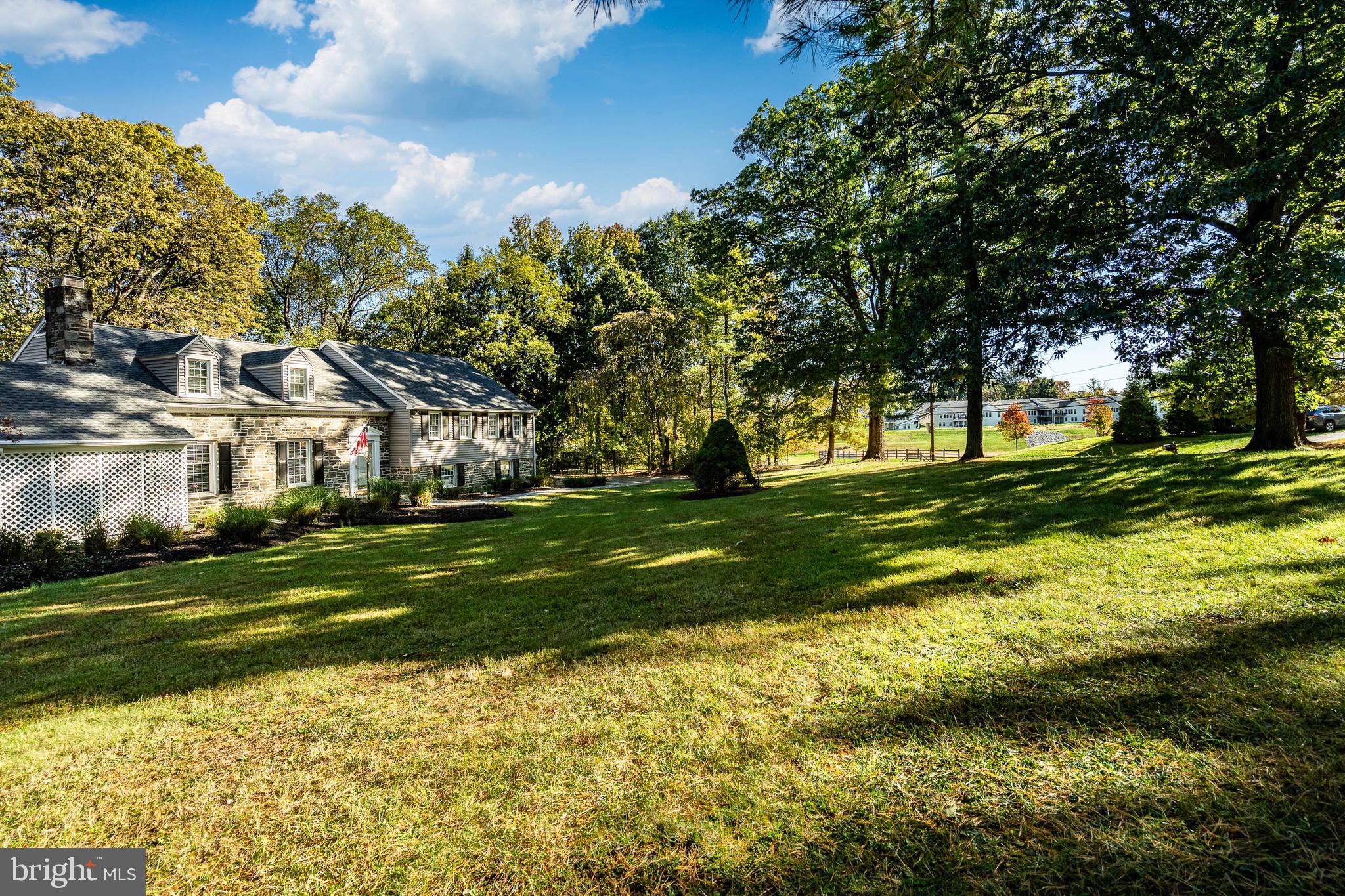 657 Walker Road Wayne, PA 19087 - Photo 8 of 66 a view of a house with a big yard