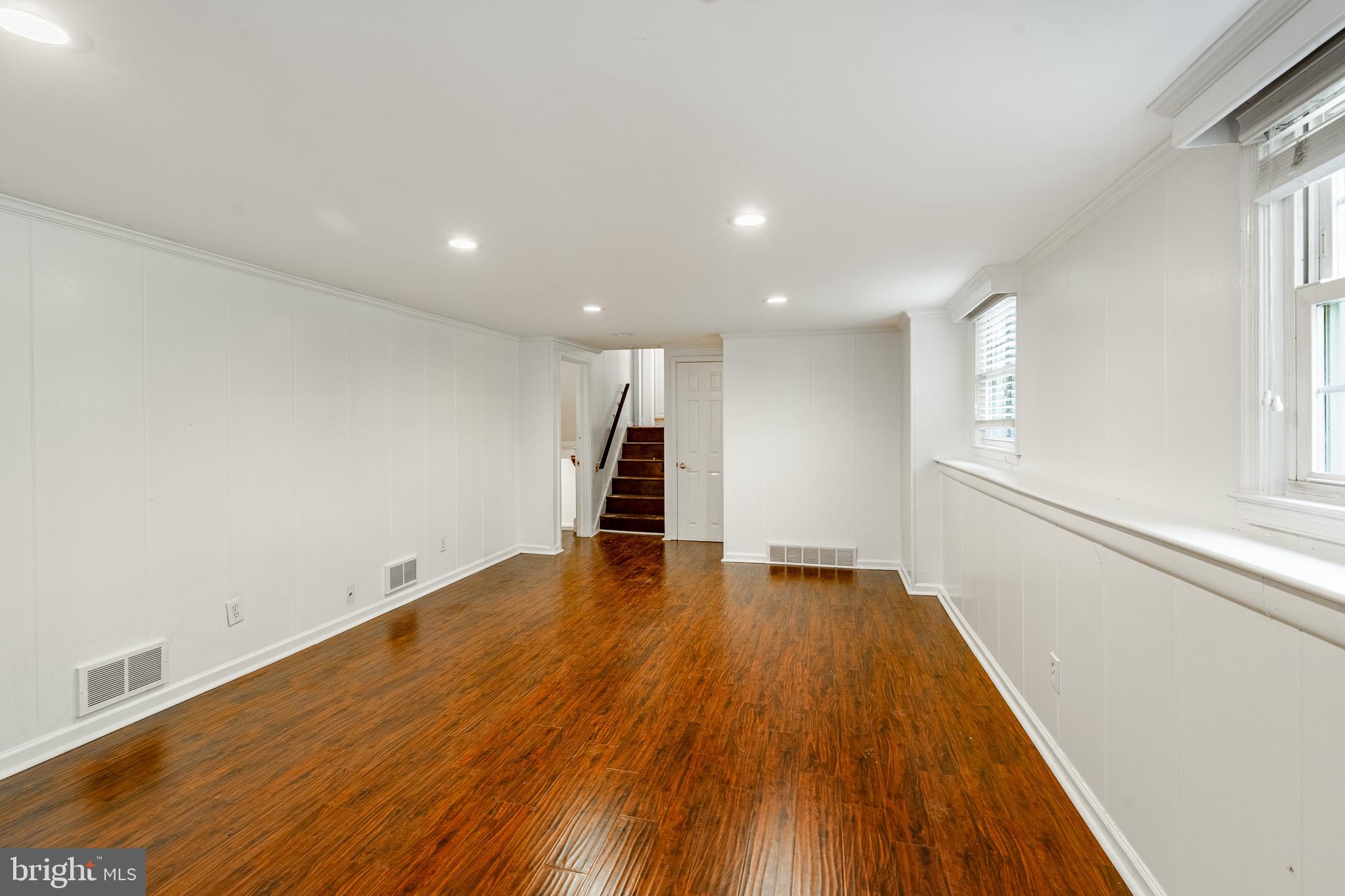 657 Walker Road Wayne, PA 19087 - Photo 10 of 66 wooden floor in an empty room with a window