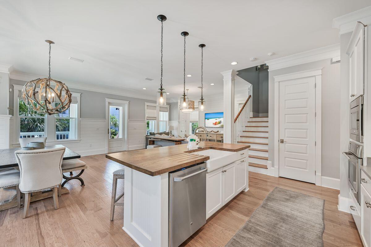 89 Clipper Street Inlet Beach, FL 32461 - Photo 15 of 49 a kitchen with a table and chairs