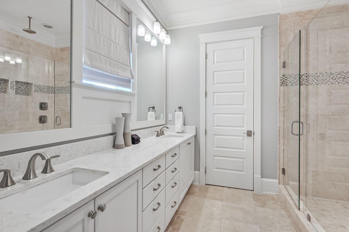 89 Clipper Street Inlet Beach, FL 32461 - Photo 19 of 49 a bathroom with a double vanity sink and mirror
