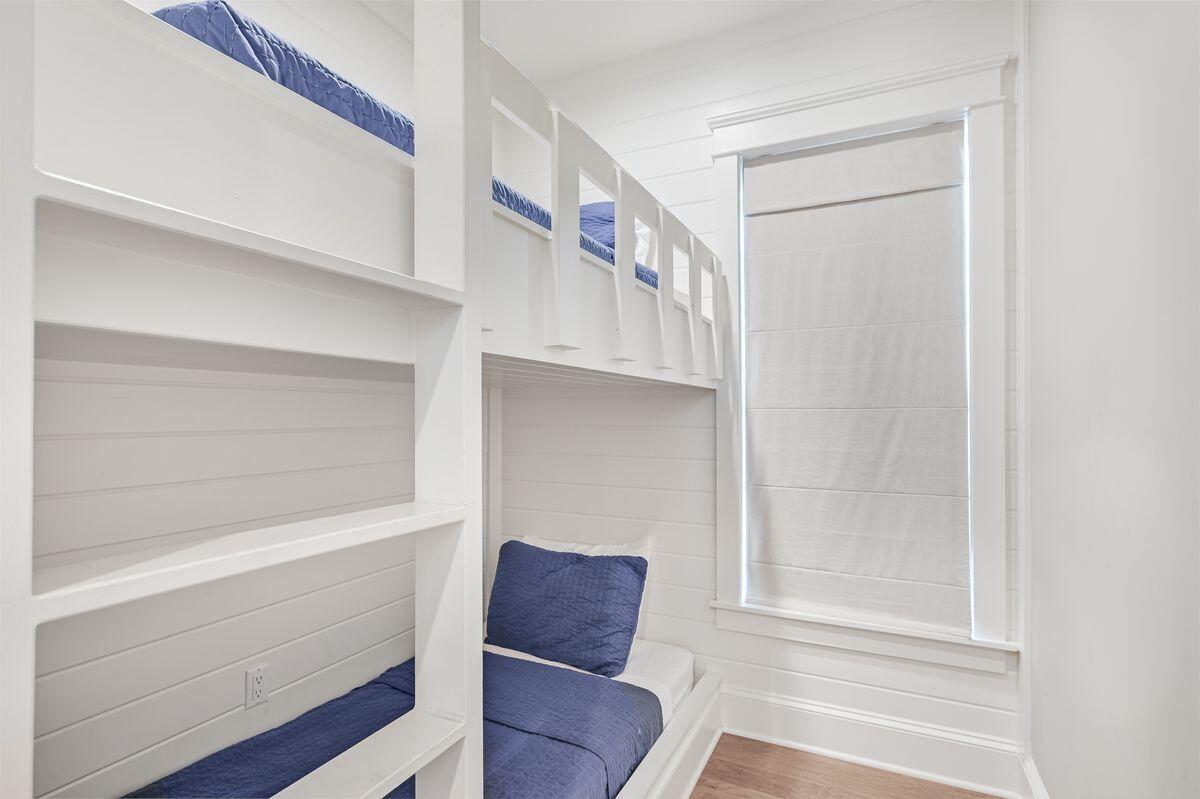 89 Clipper Street Inlet Beach, FL 32461 - Photo 24 of 49 a view of room with window and wooden floor