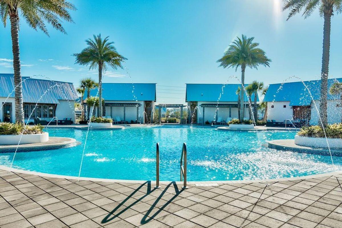 89 Clipper Street Inlet Beach, FL 32461 - Photo 34 of 49 a front view of house with yard and outdoor seating