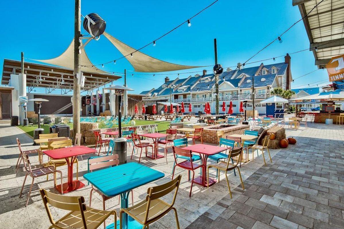 89 Clipper Street Inlet Beach, FL 32461 - Photo 42 of 49 a group of people sitting outside of a building