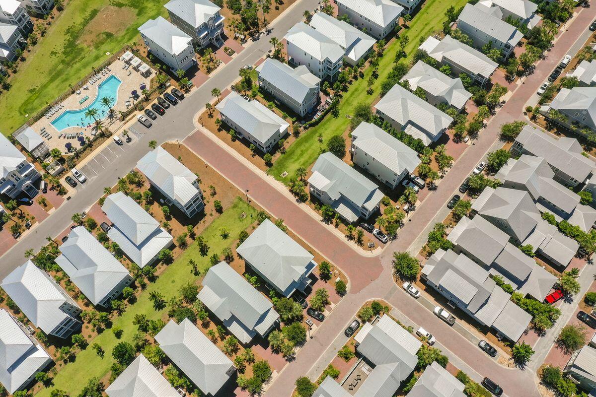 89 Clipper Street Inlet Beach, FL 32461 - Photo 49 of 49 an aerial view of a residential apartment building with parking