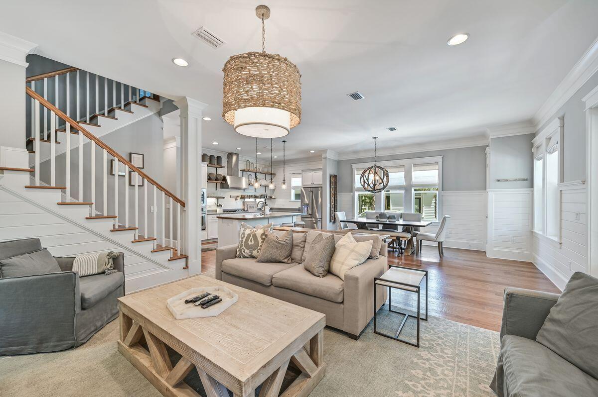 89 Clipper Street Inlet Beach, FL 32461 - Photo 9 of 49 a living room with furniture kitchen view and a chandelier
