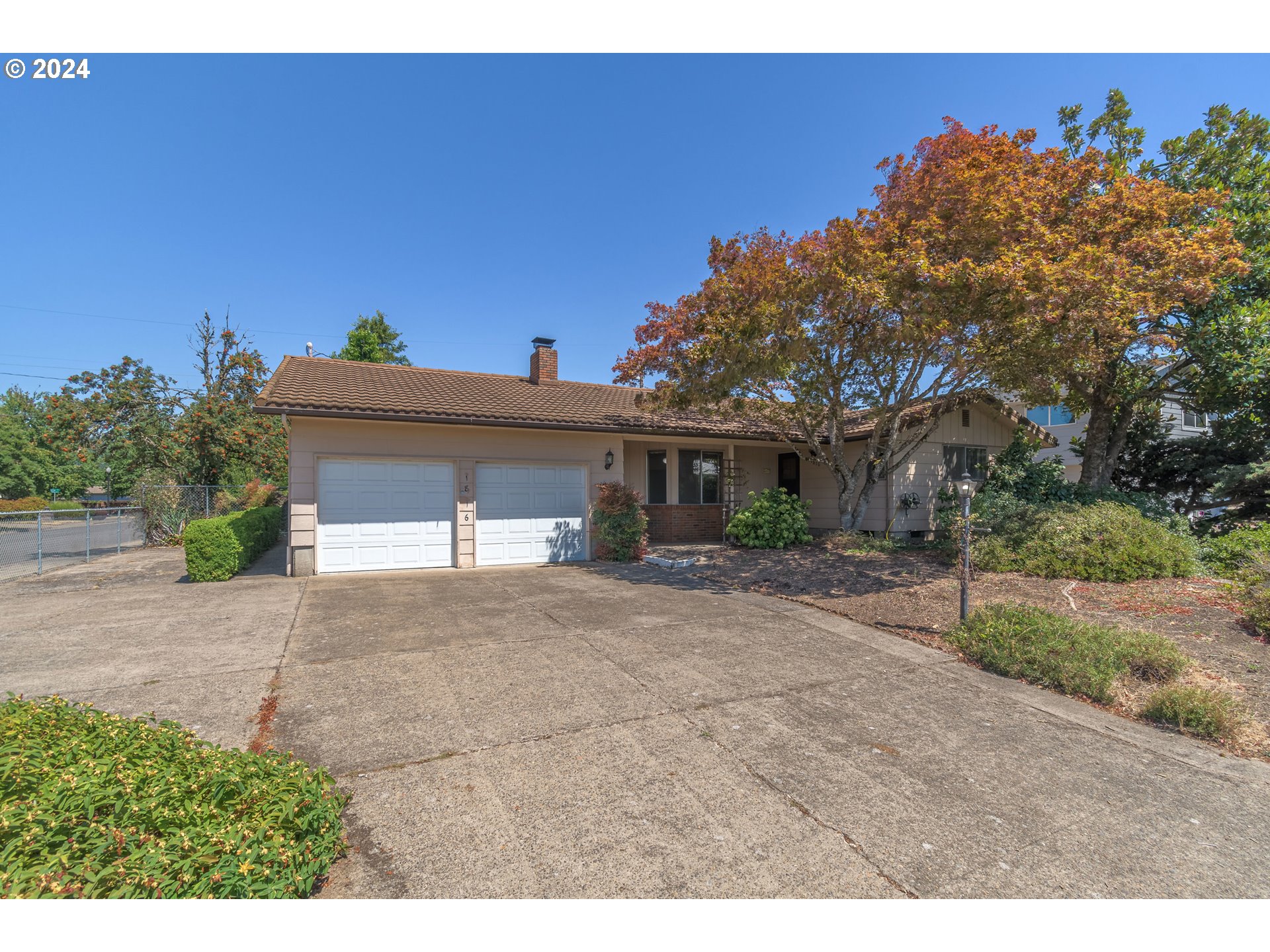 1816 Yolanda Avenue Springfield, OR 97477 - Photo 1 of 48 a view of a house with a yard and garage