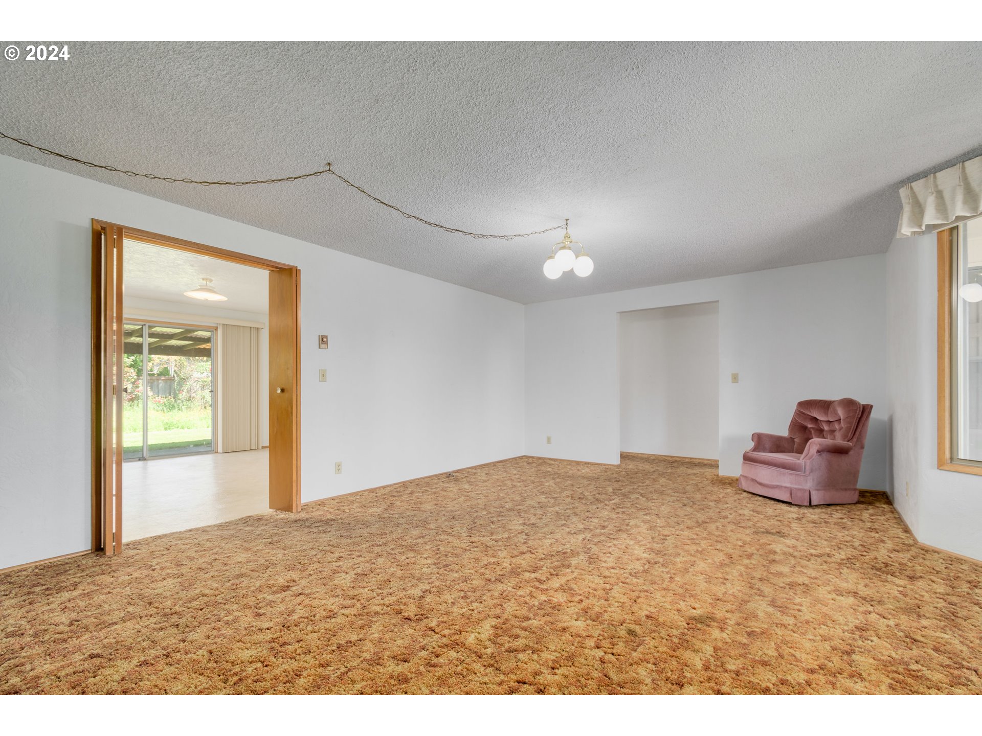1816 Yolanda Avenue Springfield, OR 97477 - Photo 8 of 48 a view of empty room with wooden floor