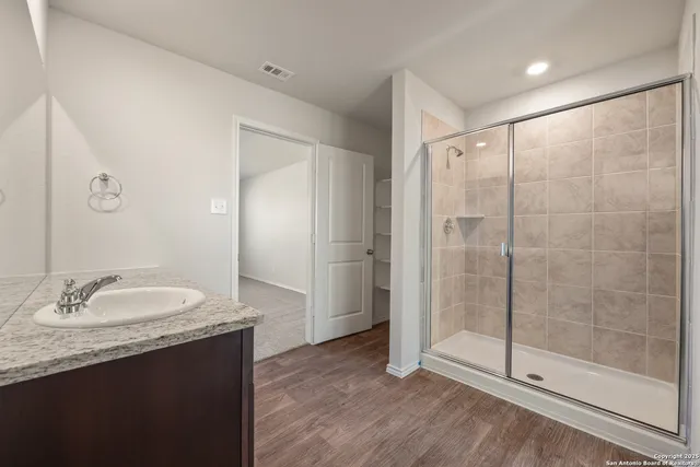a bathroom with a sink a toilet and a bathtub