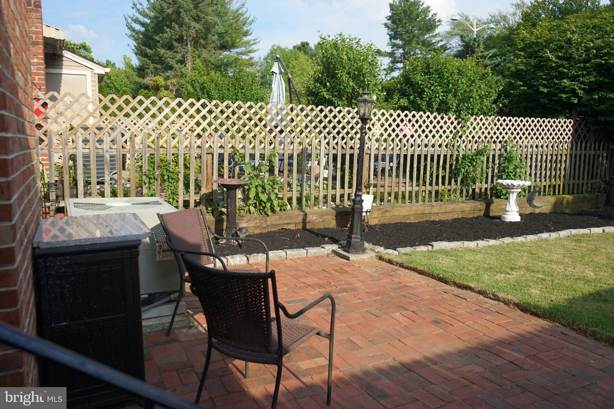 96 Farnwood Road Mount Laurel, NJ 08054 - Photo 12 of 30 Charming patio with lush greenery.