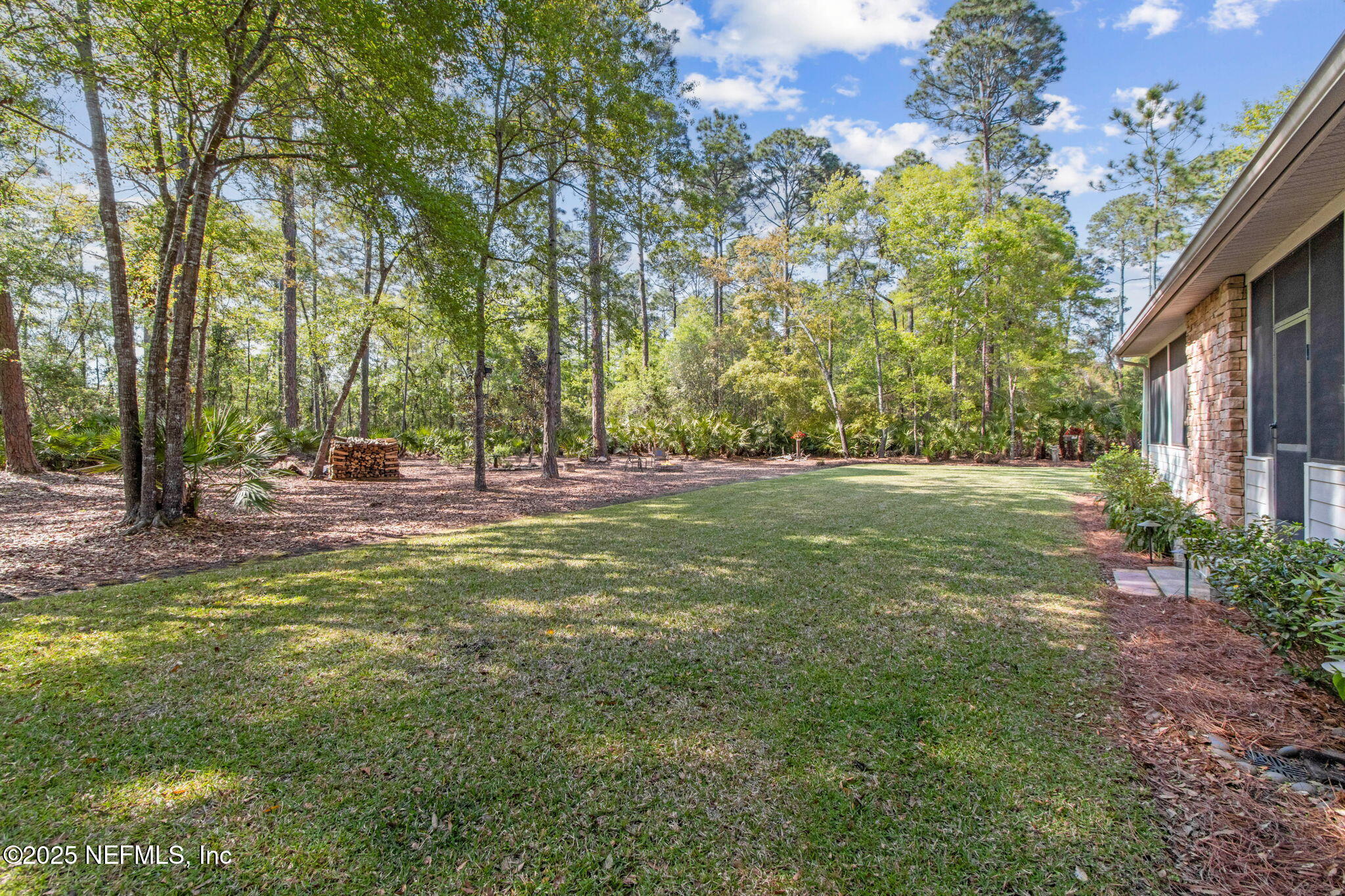 96197 Brady Point Road Fernandina Beach, FL 32034 - Photo 37 of 40 a view of a park with large trees